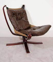 Tan leather low lounge chair designed by sigurd ressel produced by vatne mobler of norway, 1960s. A Mid Century Falcon Chair By Sigurd Ressell For Vatne Mobler At 1stdibs