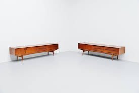 Teak is typically available either finely sanded and unfinished or treated with teak oil. Oswald Vermaercke Paola Teak Lowboard V Form Belgium 1959 Massmoderndesign