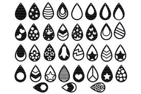 Crystal glass prism with jewel tones and sparkle light patterns closeup. Teardrop Earrings Template Graphic By Meshaarts Creative Fabrica