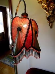 The art deco style became popular in britain in the 1920s and represented elegance, sophistication, functionality and modernity. An Original 1910 Bridge Lampshade I Restored Devils Club Leaf Art Nouveau I Replaced The Rotten Colorful Lamp Shades Small Lamp Shades Antique Lamp Shades