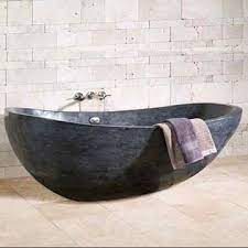 Natural marble freestanding bathtub carved from a solid block of moon white marble. Black Marble Carved Freestanding Bath Tubs Global Sources