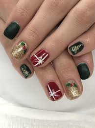 One of my favorite holiday movies is the grinch. Christmas Gel Nails Red Green Gold Holly Christmas Present Christmas Gel Nails Gold Gel Nails Christmas Nail Designs