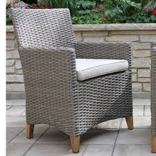 Made for use in a sun room or indoor area only. Teak Driftwood Grey Wicker Dining Chairs Against The Grain