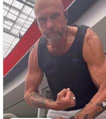 George Kittle giving his Dad, Bruce Kittle, a hug. Bruce was a four-year  letterman and co-captain of the 1982 Rose Bowl squad at Iowa and is a  former college football coach.