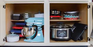 One neat and tidy way to organize your pots and pans is to place them neatly in a cabinet. Kitchen Cabinet Organizers For Pots And Pans