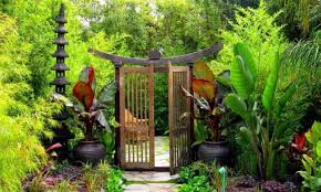 Using a simple wooden design like this fence is a great way to add character without distracting from the interesting garden behind it. 35 Beautiful Flower Garden Gate Ideas Designs And Pictures Home And Gardens