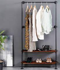 Rolling garment racks and rolling clothing racks are used as a basic single bar rack for permanent and temporary display. Buy Industrial Pipe Clothing Rack With Shelves Hanging Wall Mounted Clothes Rack Heavy Duty Rolling Garment Rack Clothes Racks For Hanging Clothes Natural Wood Base Online In Hungary B08tqtdp2j