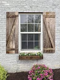 Closed board n' batten vinyl shutters Top 10 Window Shutters Decor Of 2020 No Place Called Home Window Shutters Exterior House Shutters Window Shutters Decor