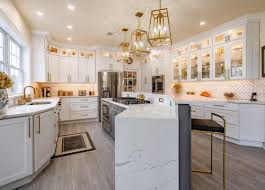 Stainless steel appliance and medium dark stain on hardwood floors. Shaker Kitchen Cabinets The Rta Store