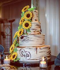 Rustic Sunflower Wedding Cake To Complete The Couple S Country Theme Brittanyhar Sunflower Wedding Cake Rustic Sunflower Wedding Themed Wedding Cakes