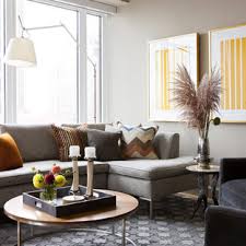 Nailhead trim along the rolled arms and a solid wood frame construction. Sofa Pillow Ideas Houzz
