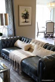 We just got a dark, dark navy couch, and our walls are cream and floors are a light maple. How To Visually Lighten Up Dark Leather Furniture Dimples And Tangles