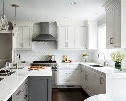 For information on quartz cleaning & maintenance, please read this guide. Dark Gray Kitchen Island With Marble Like Quartz Countertop Transitional Kitchen