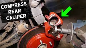 How To Compress Rear Brake Caliper Piston On Dodge Grand Caravan Chrysler Town And Country Youtube