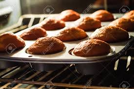 Everything you need to know when it comes to baking cupcakes. Cupcakes In A Cupcake Pan Baking On An Oven Rack Stock Photo Picture And Royalty Free Image Image 77879000