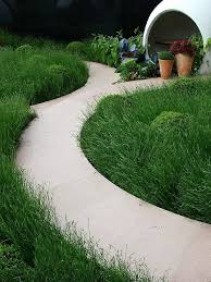 Paths Grass And Pods Diarmuid Gavin Hanover Quay Garden Low Water Landscaping Garden Pods Garden Bench Seating