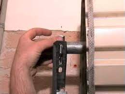Use a level and mark the wall above the door for this height. Chamberlain Roller Garage Door Installation Video Youtube