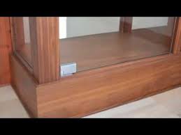 You don't have to always fit in glass panels inside wooden frames to get a fancy spin on your cabinet doors; Walnut Display Cabinet With Frameless Glass Doors Youtube