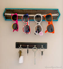 Diy glasses holder display with fun faces mod podge rocks. Simple Diy Sunglass Organization Infarrantly Creative