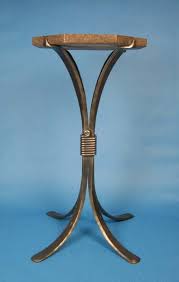 This coffee table of forged iron is a blending of rings and curves finished in rustic bronze patina. High Top Cocktail Table Wrought Iron Table Legs Wrought Iron Table Octagon Table