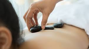 Massage is not just a luxury, it's a catalyst for good health. 4 Hot Stone Massage Benefits And 1 Reason To Skip Them Purewow