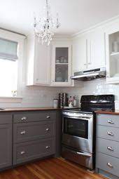 You can paint over white lacquered kitchen cabinets just as long as you do the correct prep work. Mountain Modern Life Rustic Modern Design Rv Renovations Gray And White Kitchen Grey Kitchen Cabinets Kitchen Design