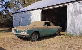 Image result for Sierra Tan 1965 Corvair