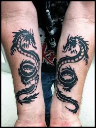 Dragons tattoo are the most trending and popular tattoo designs. Tribal Dragon Forearm Tattoo Novocom Top