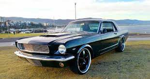 mustangs in black 1965 hardtop ford mustang coupe with 20 inch simmons wheels currently servicing wollongong and canb mustang ford mustang ford mustang coupe