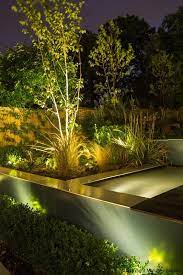 Modern Outdoor Lights Can Add Stunning Centerpieces To Yard Landscaping Or Highlight You Landscape Lighting Design Modern Landscape Lighting Landscape Lighting