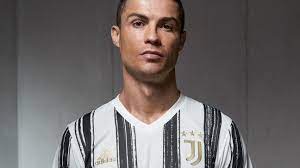 Shop juventus jerseys including men's and women's as well as jerseys for individual players like ronaldo both home and away. Cristiano Ronaldo Models Juventus 2020 21 Home Kit As Iconic Black And White Stripes Return