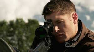 Which Supernatural episode features Sam and Dean getting weapons from the  trunk with Dean twirling a sawed-off shotgun?