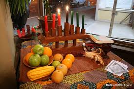Place baskets and wooden bowls of fruit and vegetables around the kinara. Kwanzaa Altar Kwanzaa Crafts Kwanzaa Decorations Kwanzaa