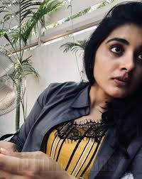 Nivedha Thomas (aka) Nivetha Thomas photos stills & images
