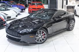 Image result for Jet Black 2011 Aston Martin
