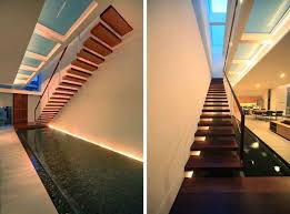 Woman going down stairs in water swimming pool. 10 Stairs W Water Feature Ideas In 2021 House Design Stairs Architecture