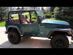 The first thing to remember when considering a replacement soft top is that the oe it takes advantage of the wrangler's sport bars to give it shape and support for an easier installation. How To Take Off Jeep Wrangler Top Roof Remove Soft Hard Top Tutorial Step By Step Youtube
