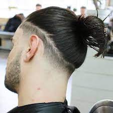 Longer Hair For Men Has Become Mainstream And With It Came The Man Bun What Is A Man Bun Well It 3 Man Bun Hairstyles Long Hair Styles Curly Hair Styles