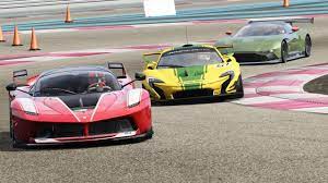 Aston martin vs ferrari race. New Mclaren P1 Gtr Vs Ferrari Fxxk Vs Aston Martin Vulcan At Paul Ricard Ready To Race Youtube