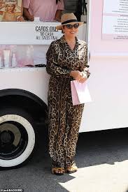Kylie skin kris jenner mother's day bundle. Kris Jenner Has A Roaring Good Time Wearing Leopard Print Jumpsuit For Kylie Skin Pop Up In La Daily Mail Online