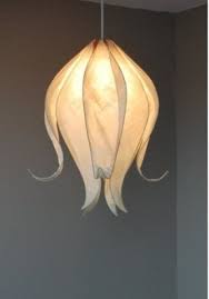 Paper mache is an old tecnique of making products with paper and some glue, and this prodoct is far way better then our normal lamp shades. Paper Pendant Lamp Ideas On Foter