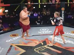 Female strawweight star fights enormous male heavyweight in massive  mismatch MMA bout - Daily Star