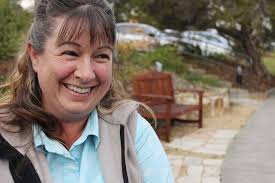 Canine cuddles: therapy dogs make a difference to Hobart residents living  with a disability