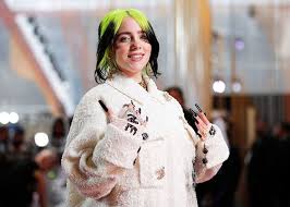 Reacting to fan requests to share the image of her lock screen and a drawing that she's proud of, eilish posted a. Billie Eilish Smacks Herself Cracks Up While Rocking A Cozy Tank Top On The Couch Sunriseread