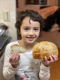 Teen sells sourdough loaves for cheer funds