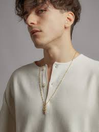 Gold figaro chain with cross pendant online