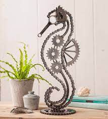 P At First Glance Our Exclusive Bicycle Chain And Gears Seahorse Sculpture Is An Intriguing Piece Of In 2021 Welding Art Projects Scrap Metal Art Metal Art Projects
