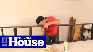 ## the pictures show a shorter length rail but your rail will be 6.6 ft long. How To Build A Rolling Library Ladder This Old House Youtube