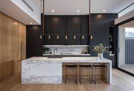 The island in this kitchen is a breakfast bar with a lower working surface on the kitchen side. Lacquer Kitchen Modern Wooden Cupboard Customied Kitchen Cabinets In 2021 Modern Kitchen Island Design Luxury Kitchen Design Modern Kitchen Island