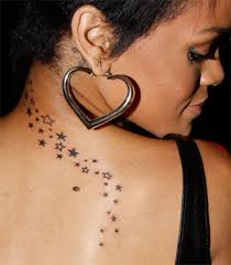 Check out 19 of her most popular tattoos as you can see here, rihanna got a neck tattoo with the text rebelle fleur, again a bang bang creation. Rihanna Star Tattoo Discovered By Amee On We Heart It